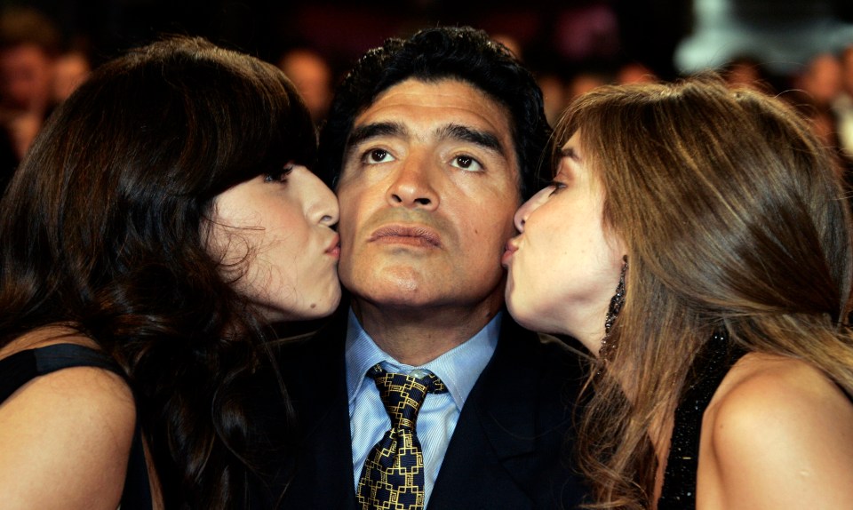 Diego Maradona with his two daughters Giannina and Dalma in 2008