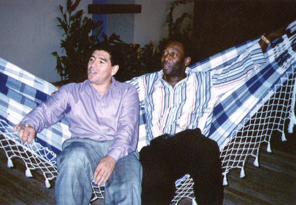 The two greatest of all time - Maradona and Pele - relax together on a hammock 