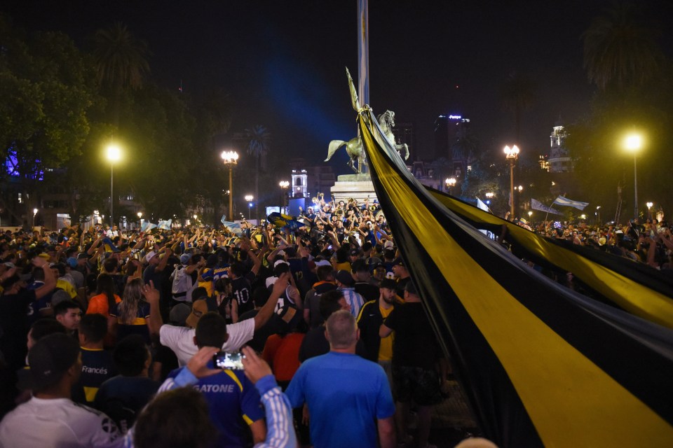 People gather outside the Casa Rosada presidential palace ahead of the wake for Maradona 