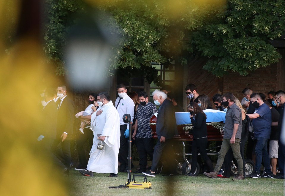 About a dozen people were present for the private religious ceremony and burial of the former forward