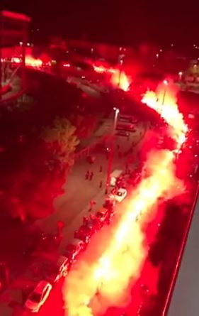 Napoli fans turned the streets of their city into a 'wall of fire' with flares in tribute to Diego Maradona