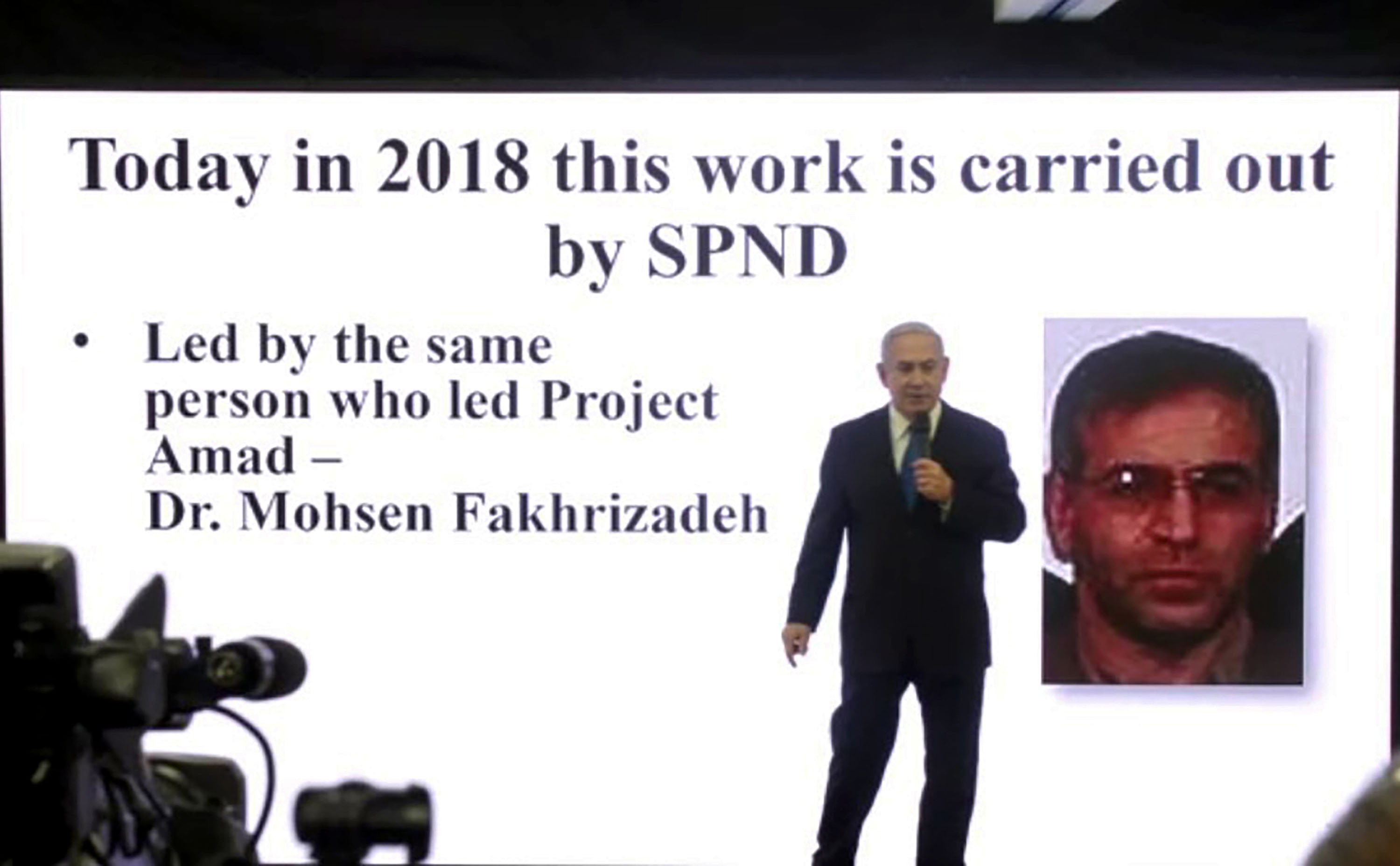 Israeli has been blamed for the killing... PM Benjamin Netanyahu is pictured here naming the scientist during a speech on Iran's nuclear program in 2018