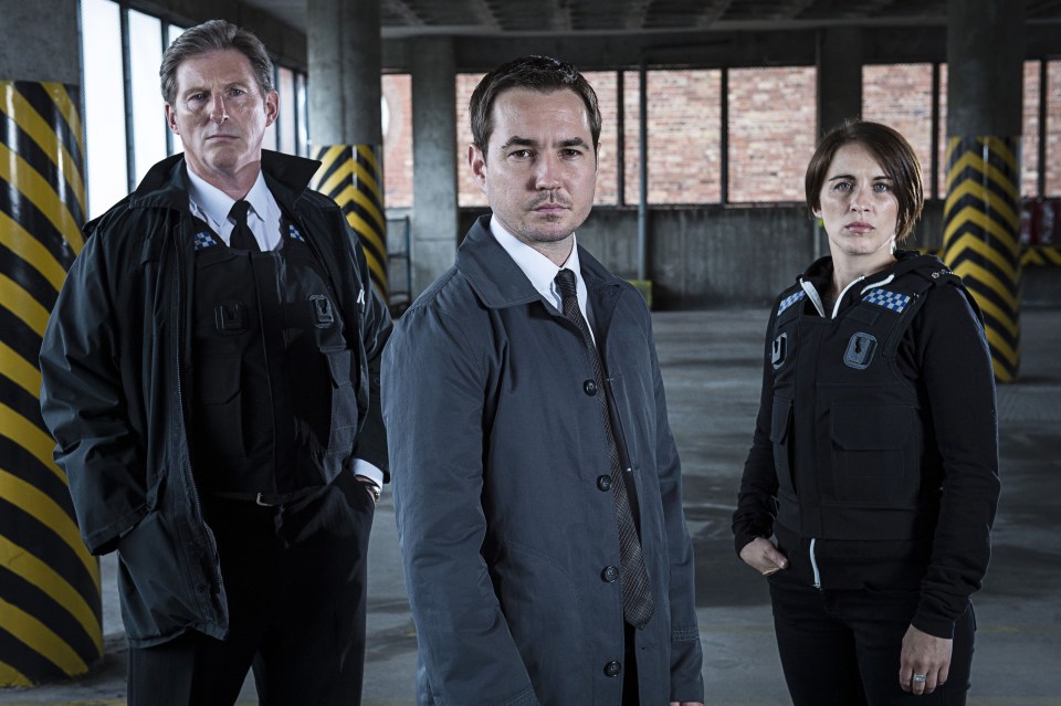 Superintendent Ted Hastings (Adrian Dunbar), Detective Sergeant Steve Arnott (Martin Compston) and Detective Constable Kate Fleming (Vicky) in Line Of Duty