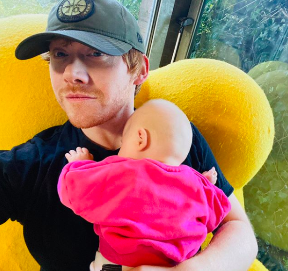 Rupert Grint with his daughter Wedneday who was born in May