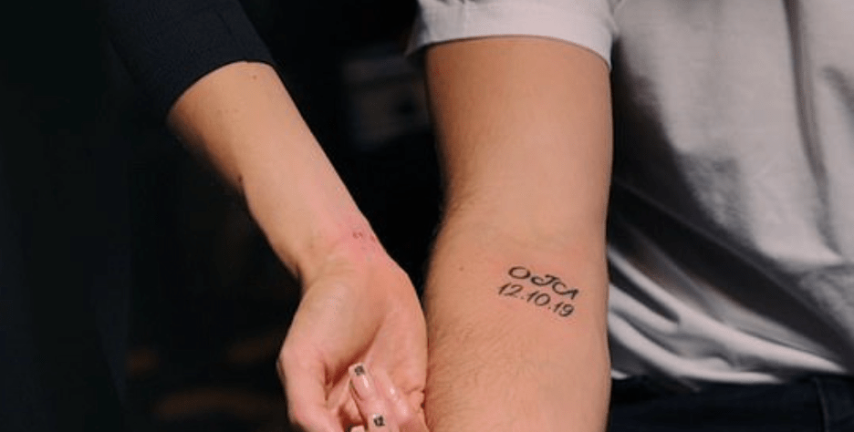 Olivia and Bradley show off their matching tattoos