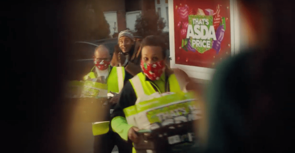 During the advert, Asda drivers deliver food wearing face masks