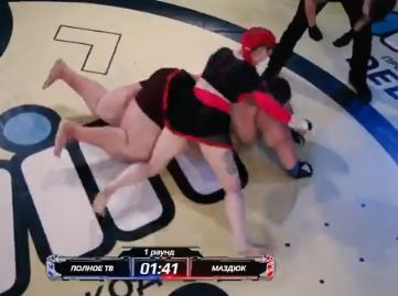 Darina Madzyuk forces giant opponent Grigory Chistyakov to tap out