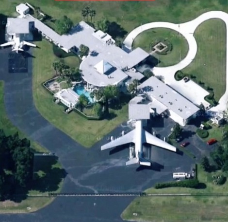 The Grease star bought an airport to live in which house his five plane