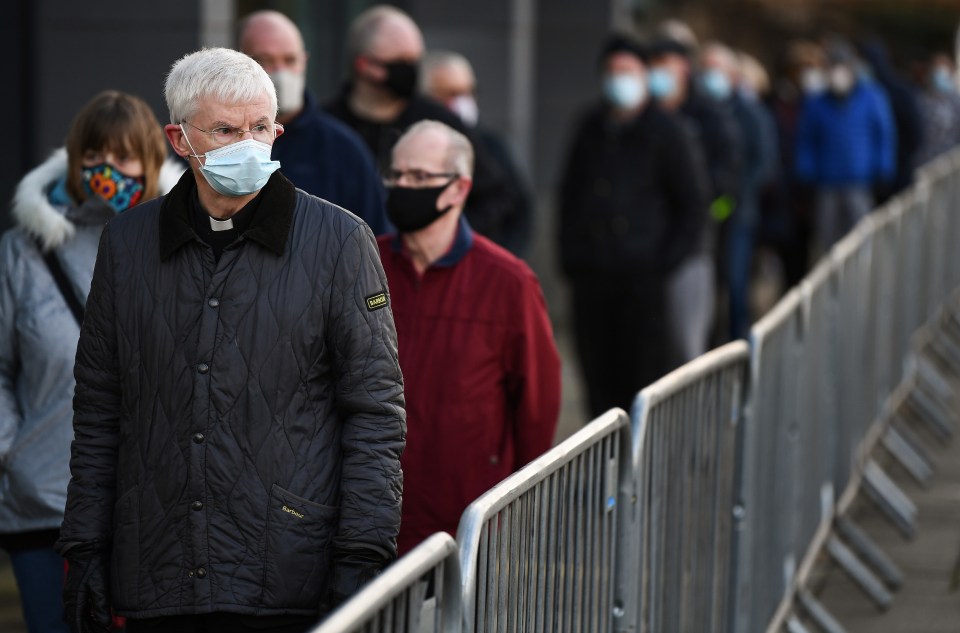 Brits queue to receive a test at a walk-in centre