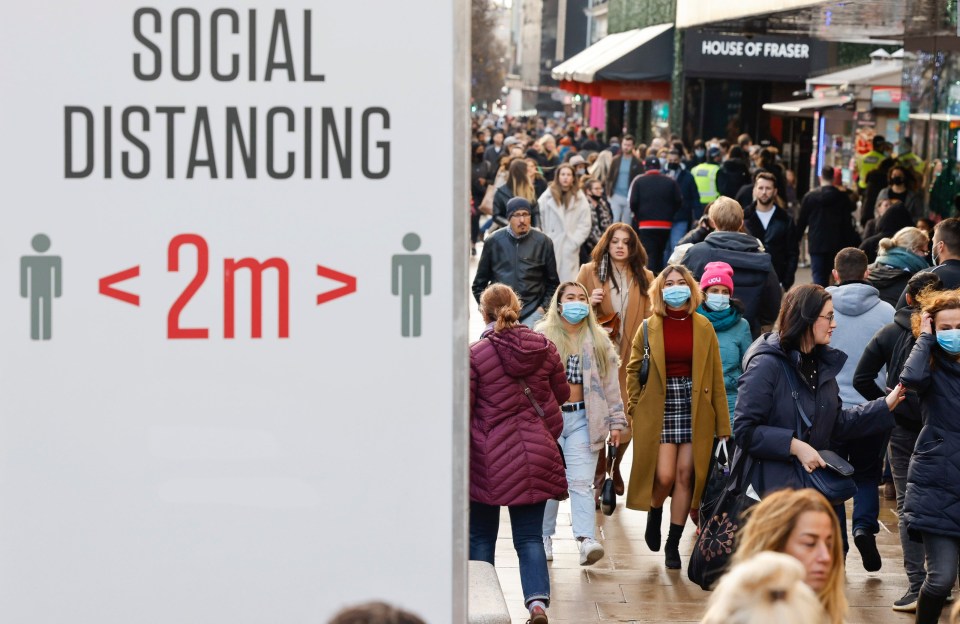 A photograph taken at the same spot on Oxford Street yesterday shows how the crowds have disappeared