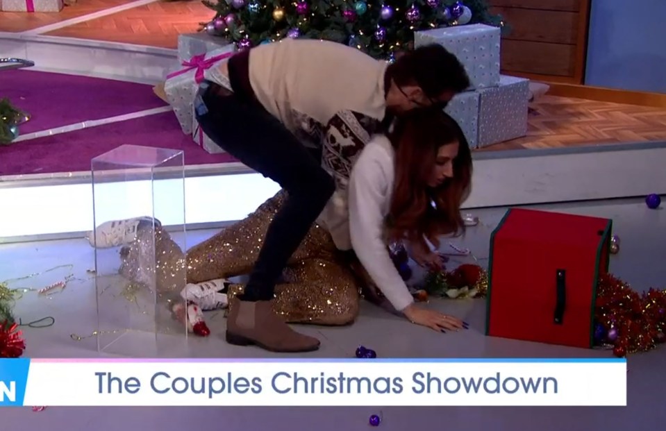 Joe's trousers fall down as he tries to pick Stacey back up