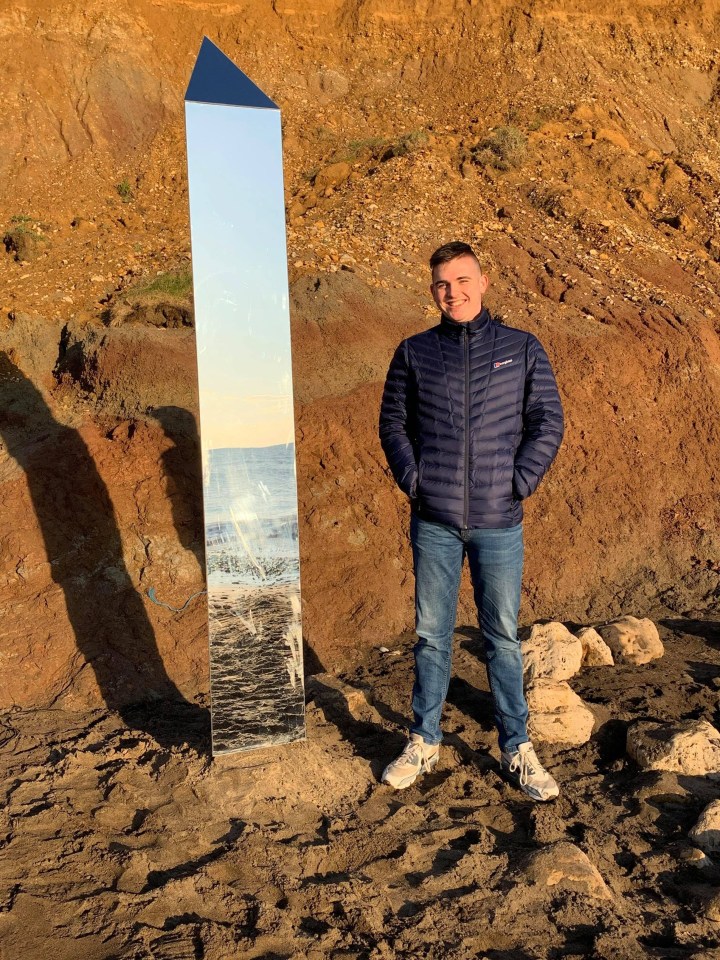 Local Peter James stands next to the strange 10ft monolith