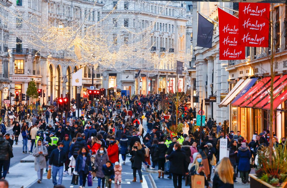 The popular shopping strip was teeming with Brits yesterday before lockdown