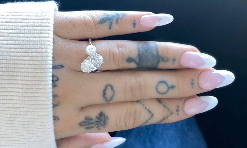 She shared a snap of her flashing diamond ring