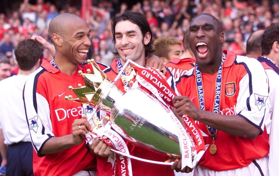 Sol Campbell (right) took a huge gamble in trading one North London club for another