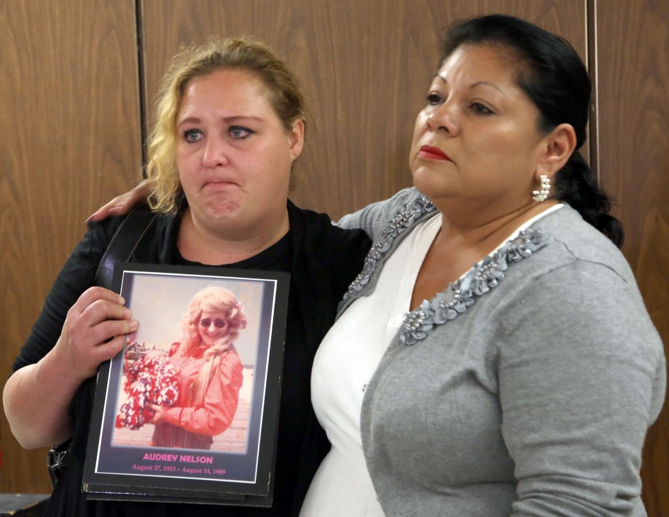 Pearl Nelson clutches a picture of her mother, Audrey, who died at Little's hands