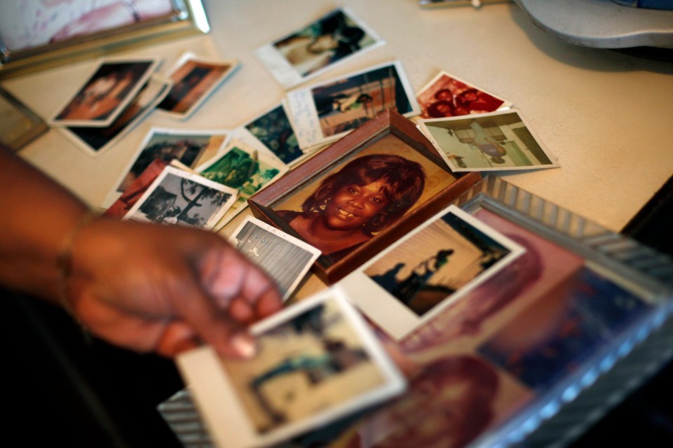 Brenda Gordon with pictures of her mother Carol Elford, murdered by the monster