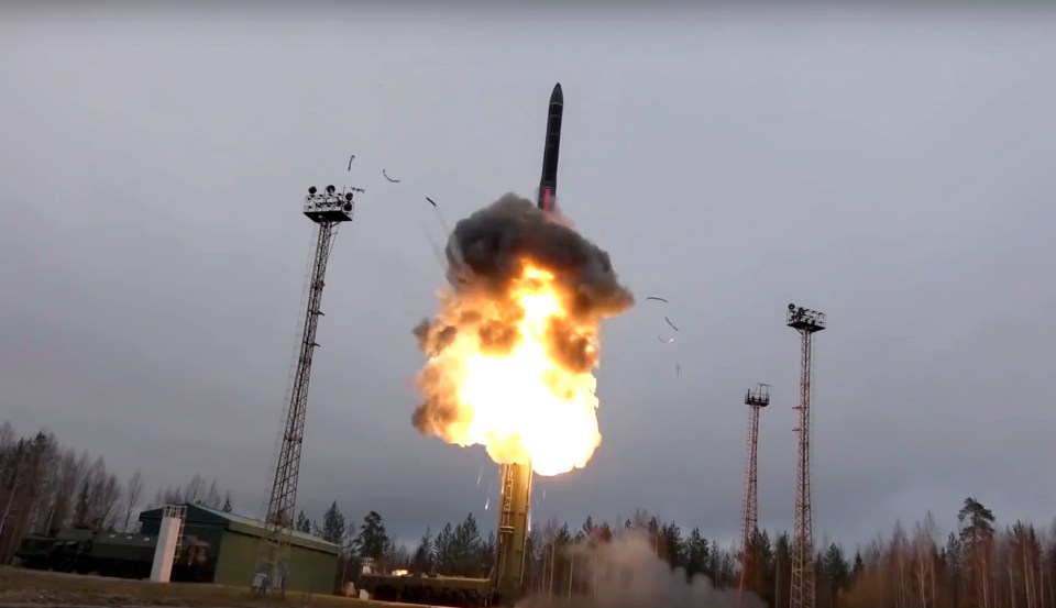 An intercontinental ballistic missile lifts off from a launcher during testing in Russia