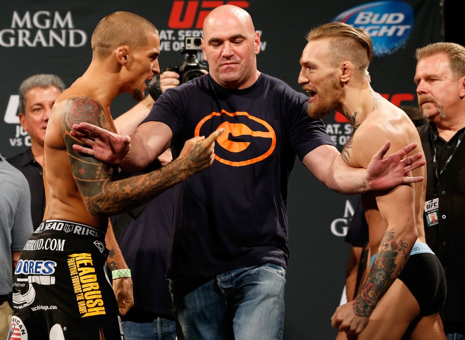 Dana White separates Dustin Poirier and Conor McGregor at the UFC 178 weigh-ins