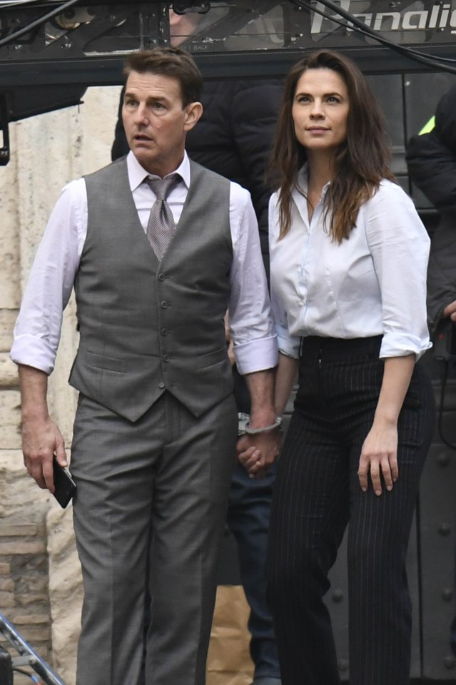 Tom Cruise and Hayley Atwell handcuffed on the set of Mission: Impossible in Rome last month