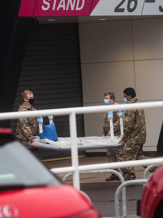 Members of the army during a practice run at Ashton Gate in Bristol - one of the UK's designated mass vaccination hubs