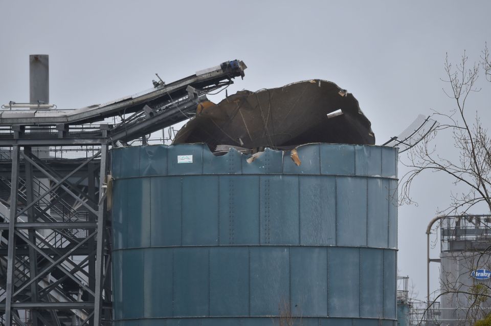 The victims were reportedly standing on the roof of a silo, which was badly damaged in the blast