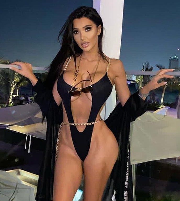 While the glamorous Chloe Khan bared all with a gold-chain design