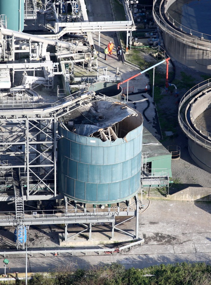 The silo can be seen badly damaged