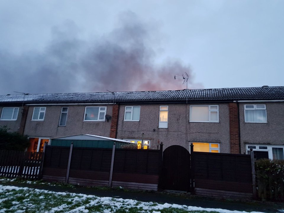 Smoke can be seen billowing into the sky