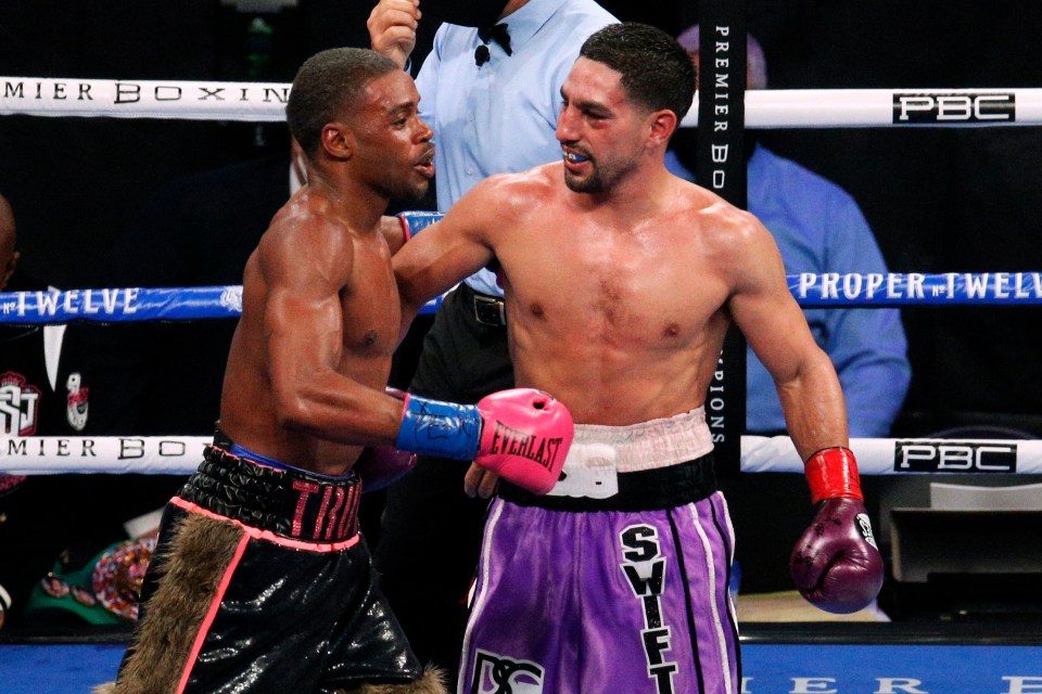 Spence and Garcia embrace after they go the full 12 rounds 