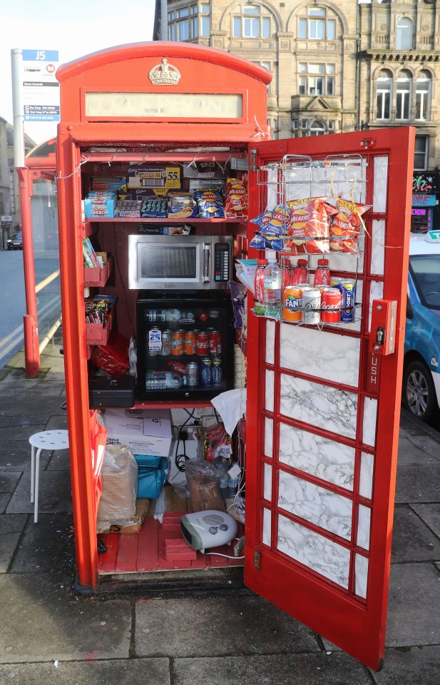 Enterprising Nizam fitted out the old BT boxes with electrical sockets, lights, a coffee and tea-maker