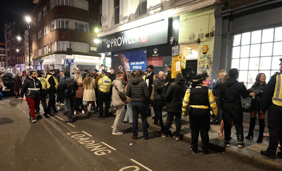 Police chattered to revellers who crowded onto streets