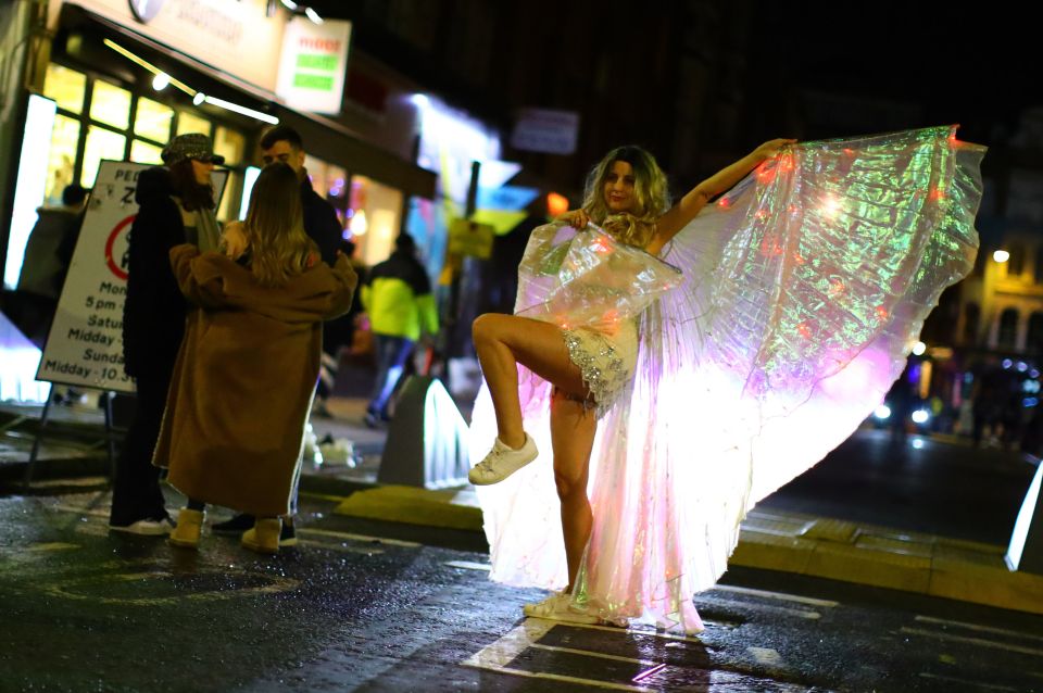 Colourful party-goers made their way home after the 11pm shut-down