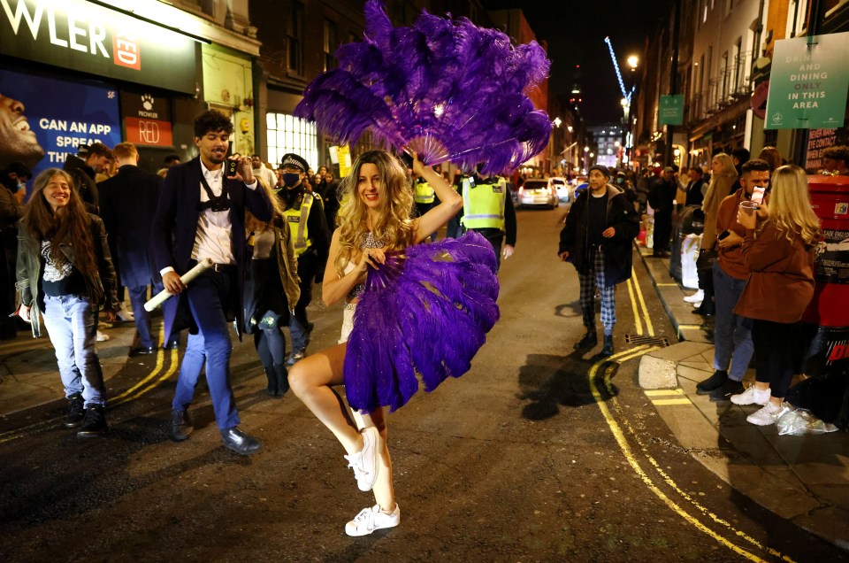 The streets were buzzing in Soho as people left the pub for the last time in 2020