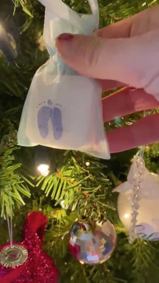 She even has a tiny print of one of her baby's feet