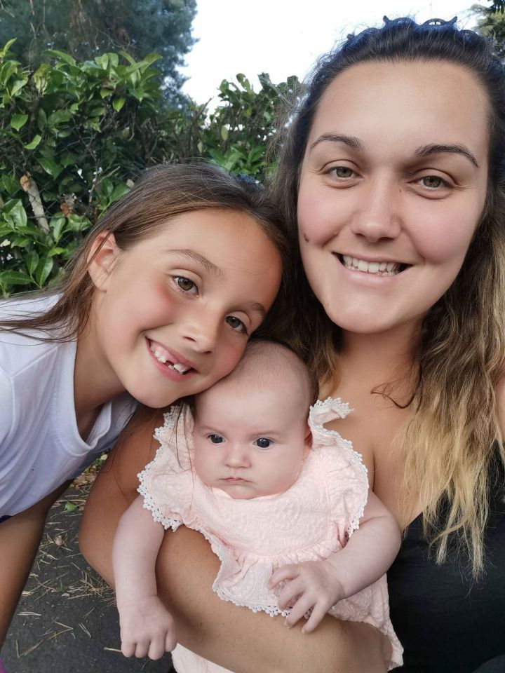 Laura with her two daughters Matilda [left] and Delilah