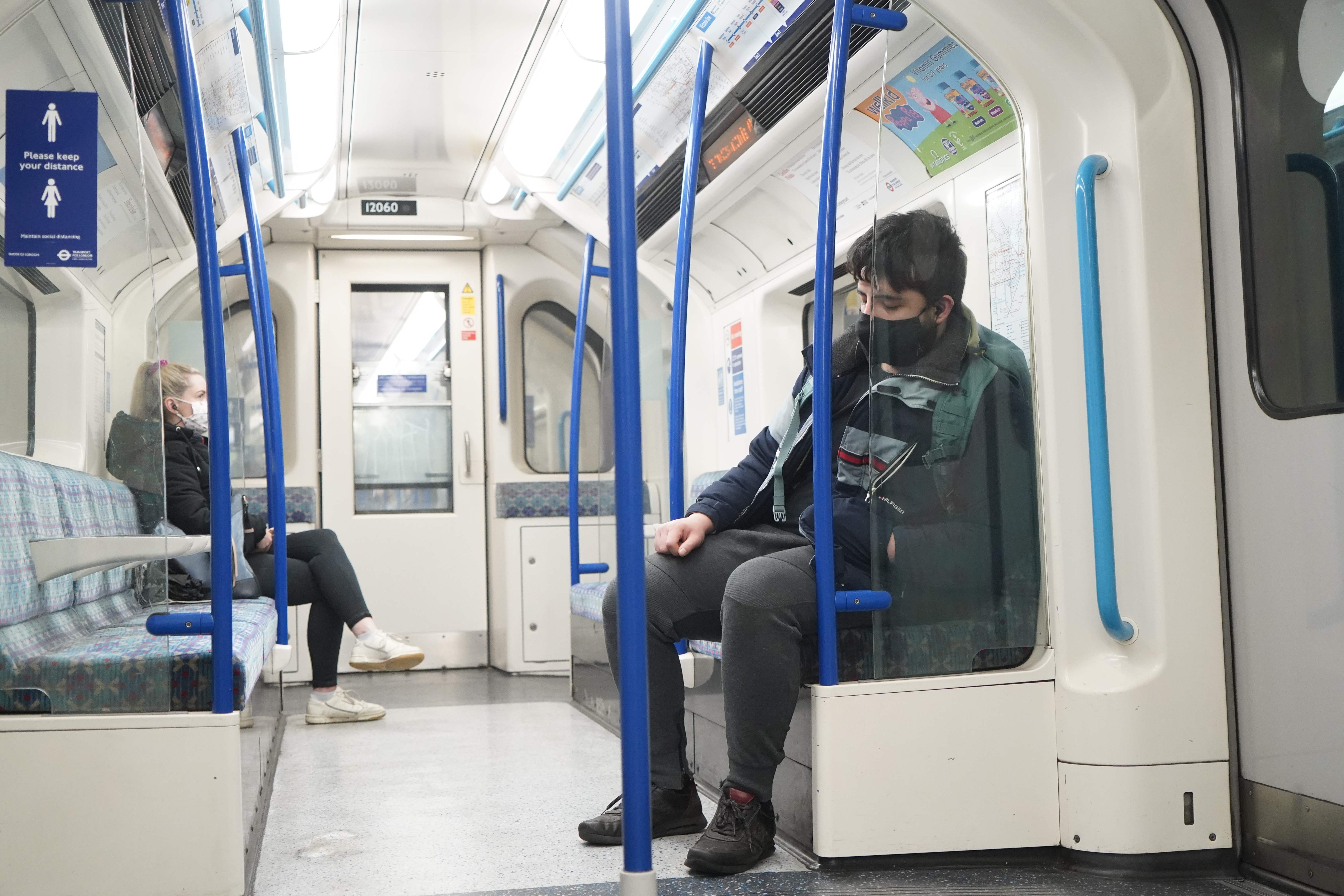 An almost empty carriage on London Underground during rush hour on December 21