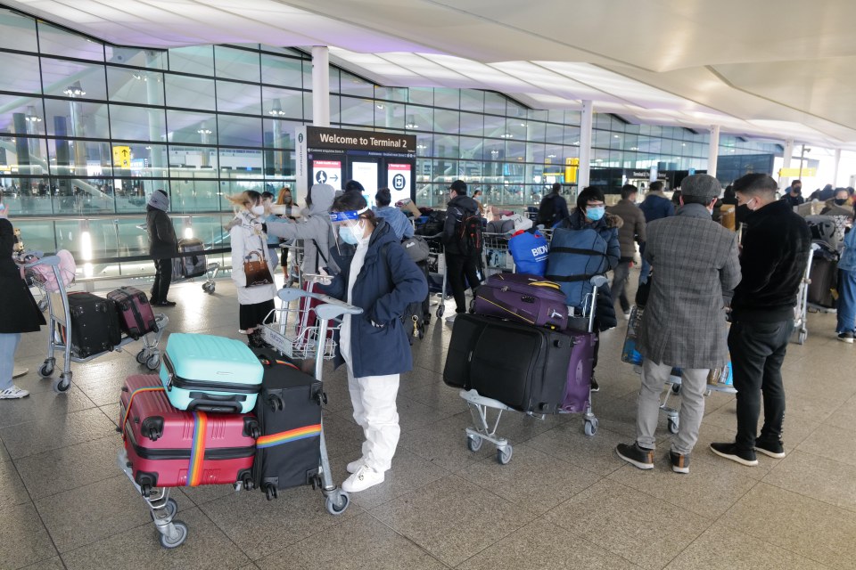 Pictures show long queues of travellers waiting to gain entry to departures