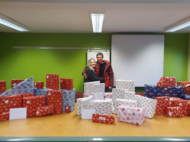 Charlotte and Dan's colleagues at courier Yodel have given them 40 Christmas gifts for their children