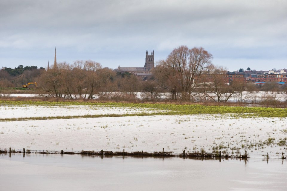 The River Severn near Worcester, England, has broken its banks as surrounding farmland is under several feet of water