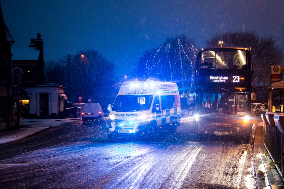 An ambulance battles through the snow in Harborne, Birmingham