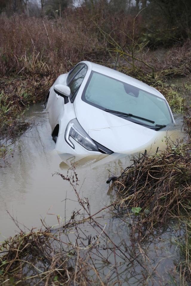 A man suffering hypothermia was rescued after his car plunged into water that came to his chest in Essex last night