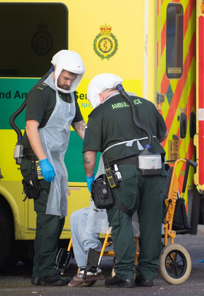 A patient arrives by ambulance to Southend University hospital in Essex this afternoon