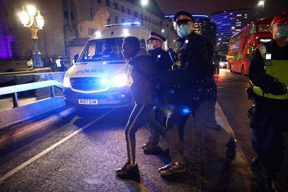 A man is detained in South Bank, London last night