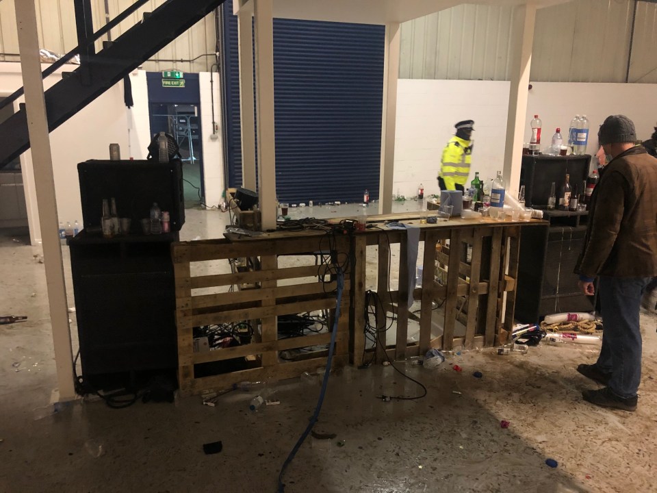 Bottles were left strewn across the warehouse floor after the NYE party was broken up