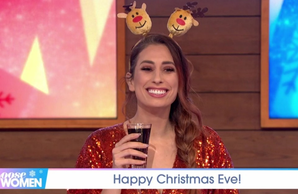 Sober Stacey Solomon stuck to a champagne glass filled with Coke