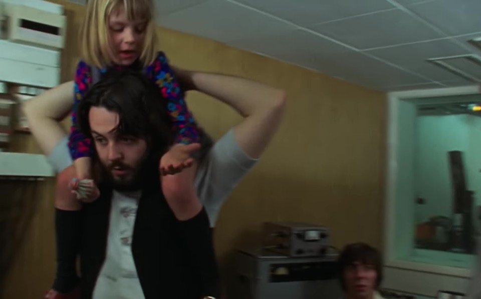 Paul carries Linda’s seven-year-old daughter Heather around on his shoulders