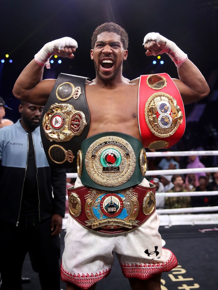 Anthony Joshua celebrates reclaiming the unified heavyweight titles