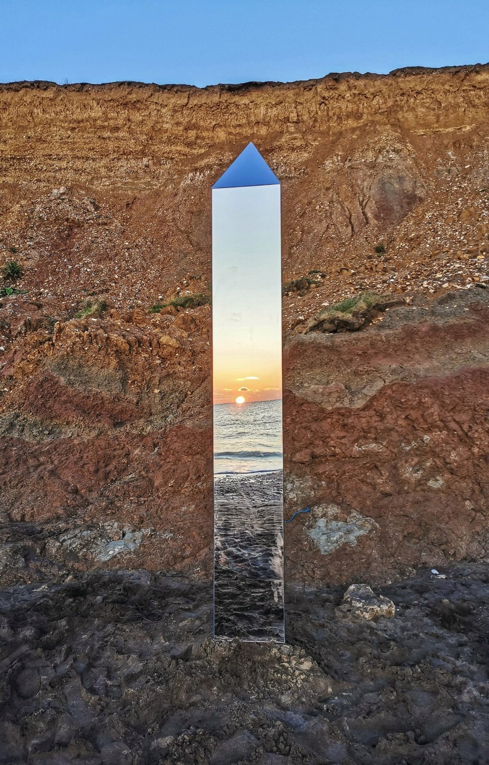 A mysterious monolith was spotted on Compton Beach on the Isle of Wight Credit: Solent News