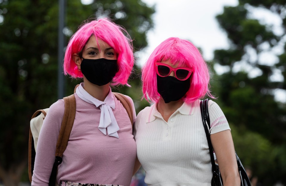 This pair jazzed up their look with bright pink wigs